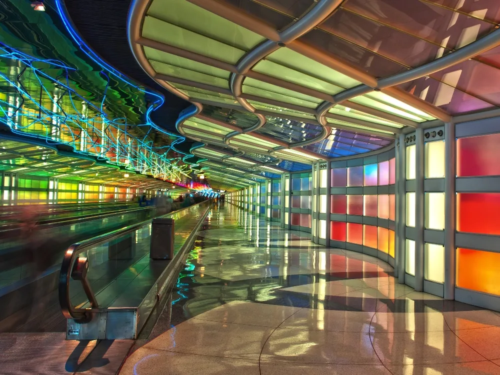 The neon tunnel between O'Hare Terminal 1 concourses